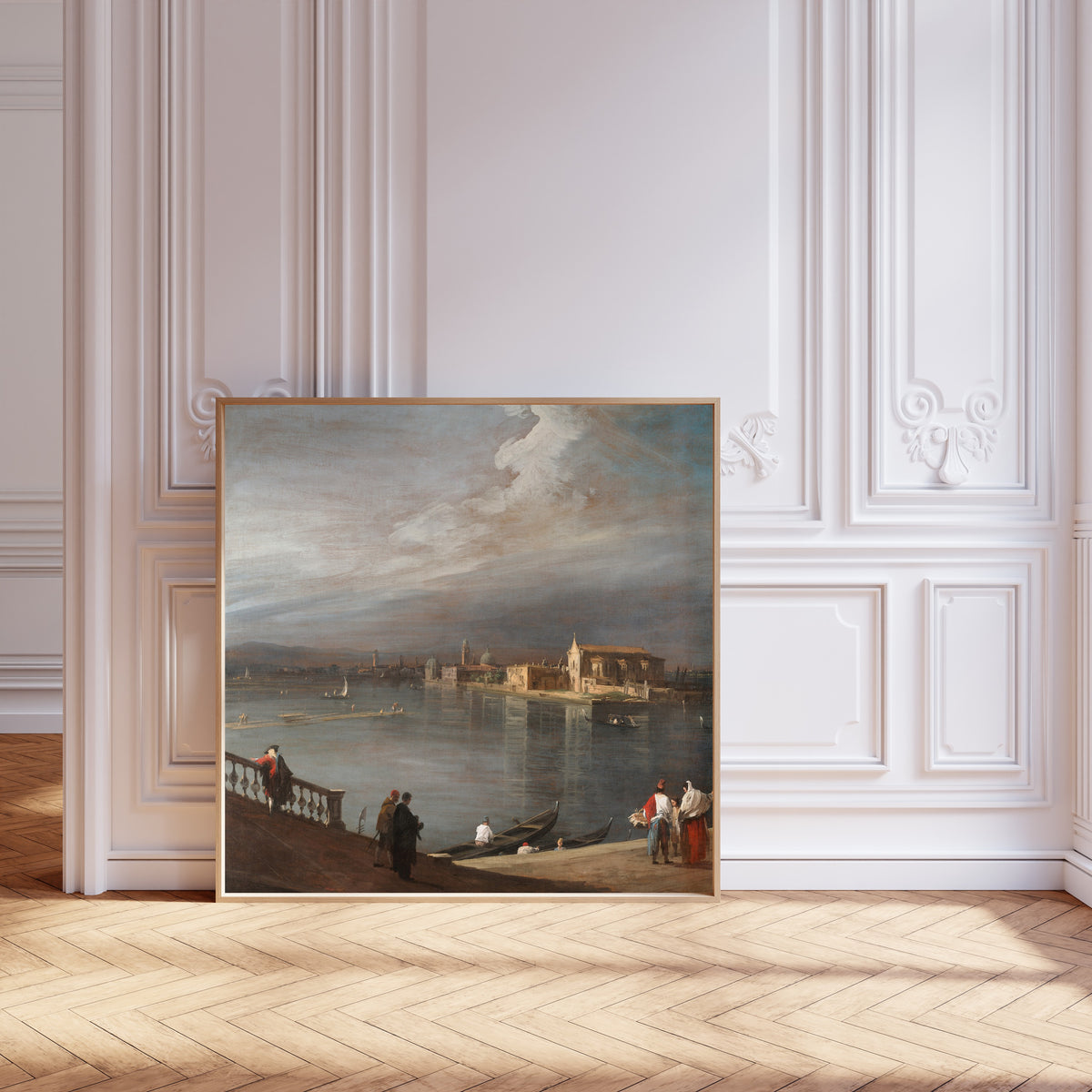 Framed art print of San Cristoforo, San Michele, and Murano from the Fondamenta… by Canaletto, leaning against pale pink panelling on a herringbone floor