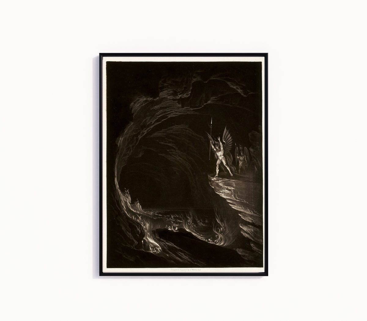 Framed art print of Satan Arousing the Fallen Angels, from Paradise Lost, Book 1 by John Martin, in a slim black frame on a plain white wall