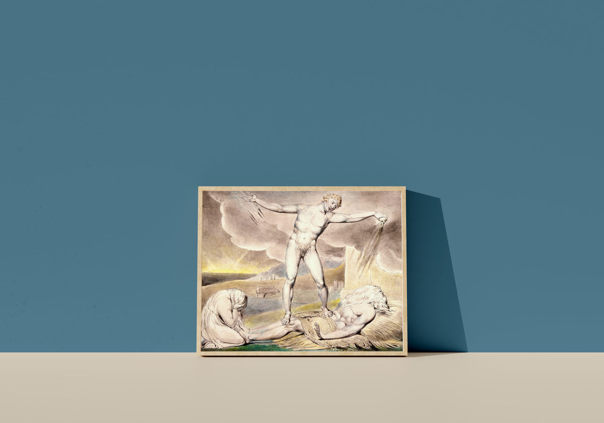Framed art print of Satan Smiting Job with Boils by William Blake, in a light wood frame leaning on a blue wall