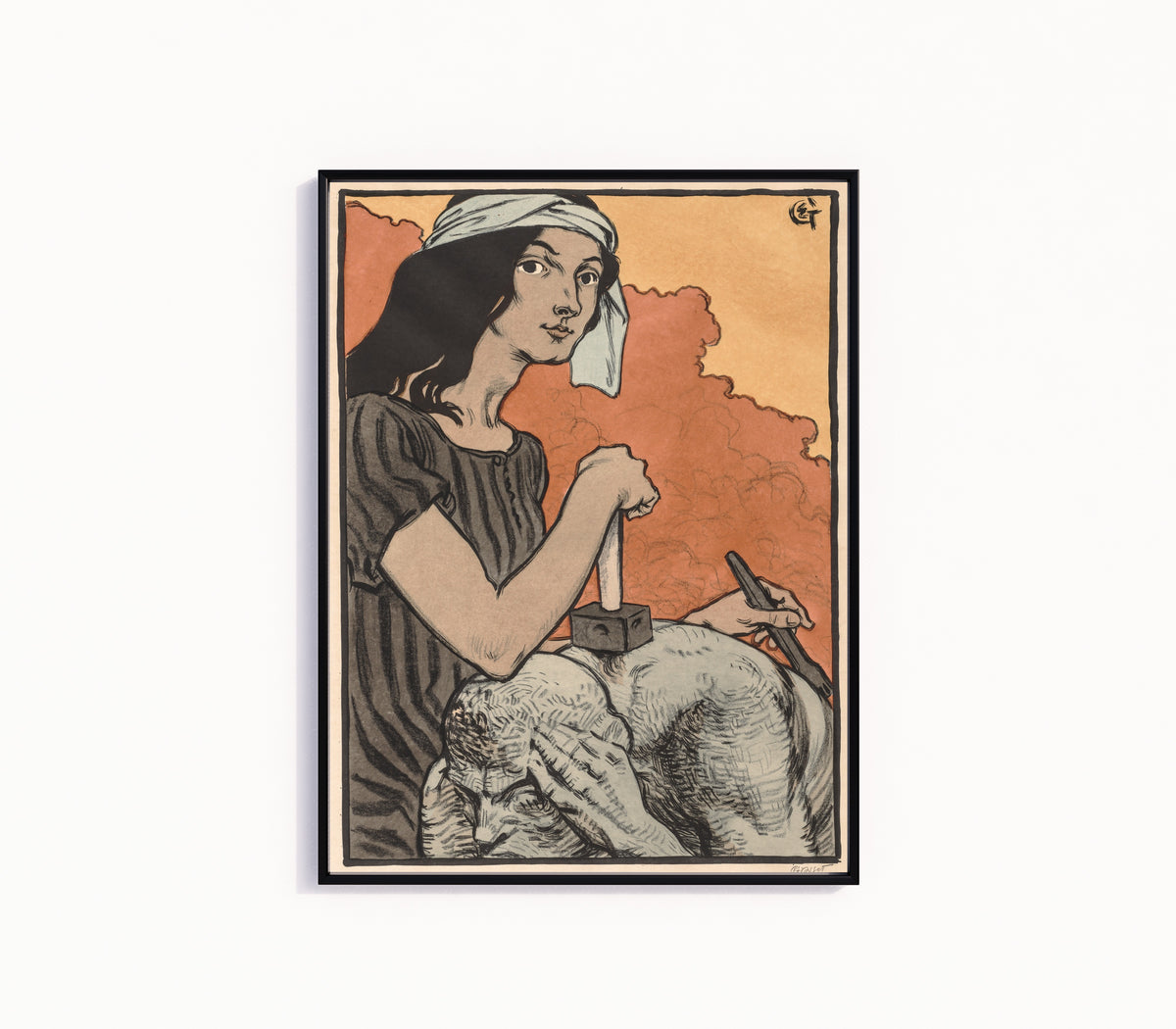 Framed art print of Sculptress by Eugène Grasset, in a slim black frame on a plain white wall