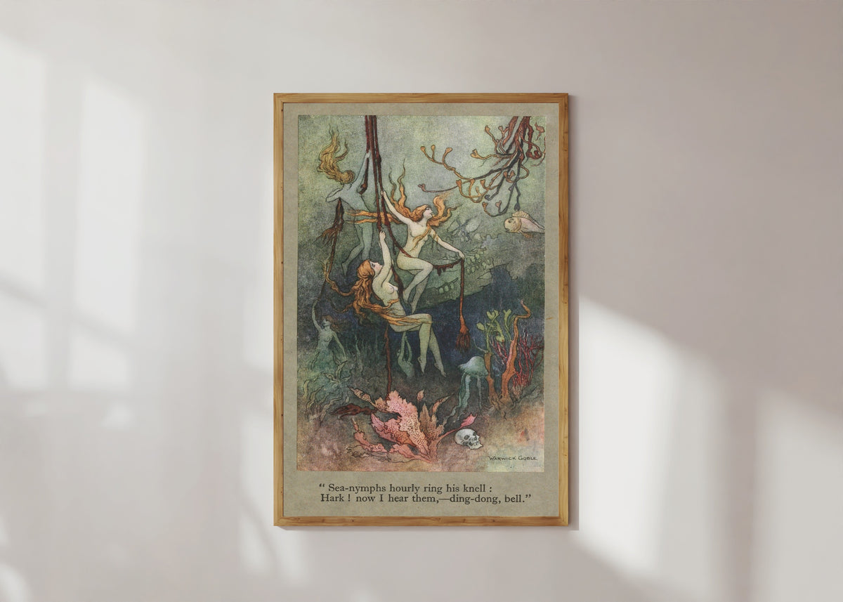 Framed art print of Sea-nymphs hourly ring his knell; Hark! now I hear them,—ding-dong, bell. by Warwick Goble, in a light wood frame on a sunlit white wall