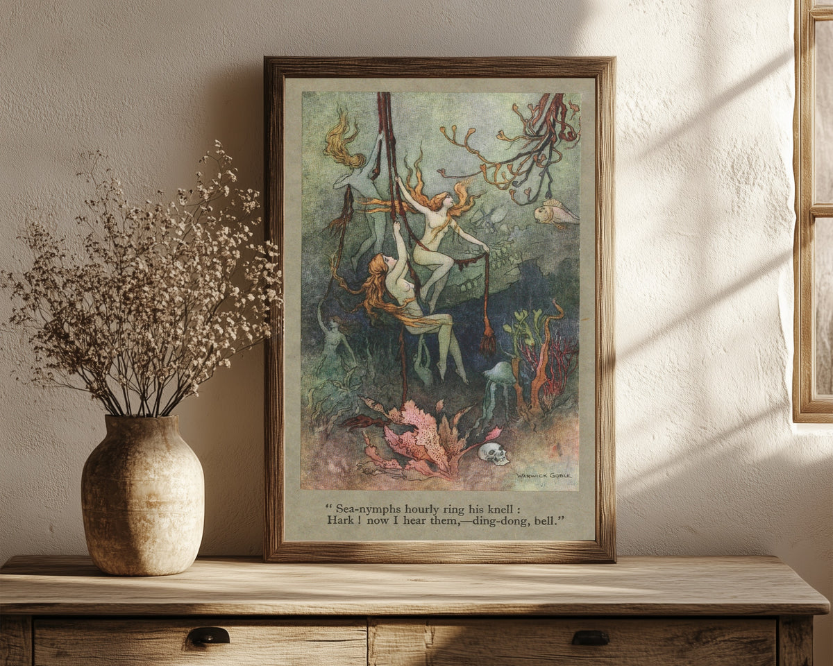 Framed art print of Sea-nymphs hourly ring his knell; Hark! now I hear… by Warwick Goble, in a dark wood frame leaning on a rustic console beside dried flowers
