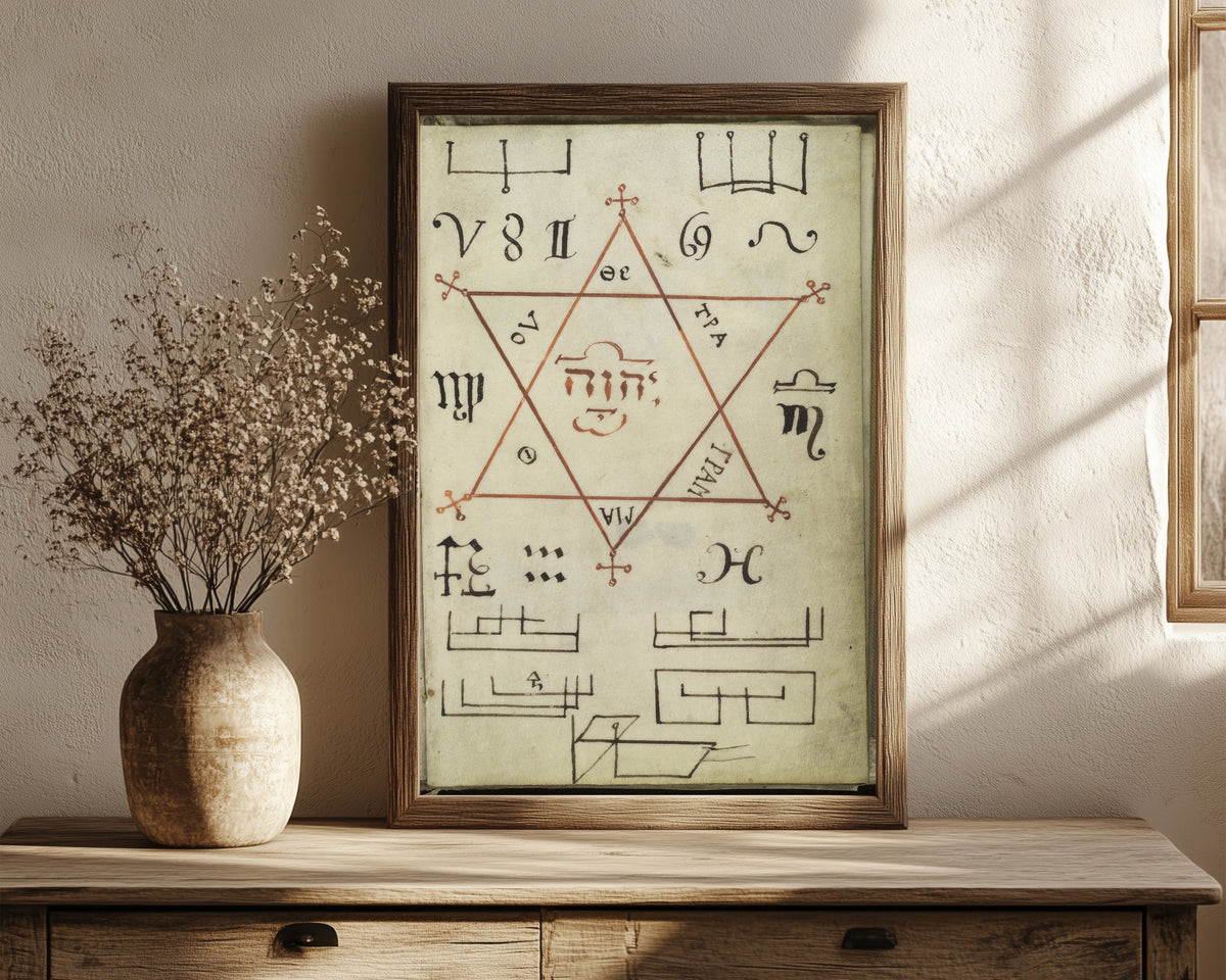 Framed art print of Seal of Approbata, from Cyprianus by Unknown artist, in a dark wood frame leaning on a rustic console beside dried flowers