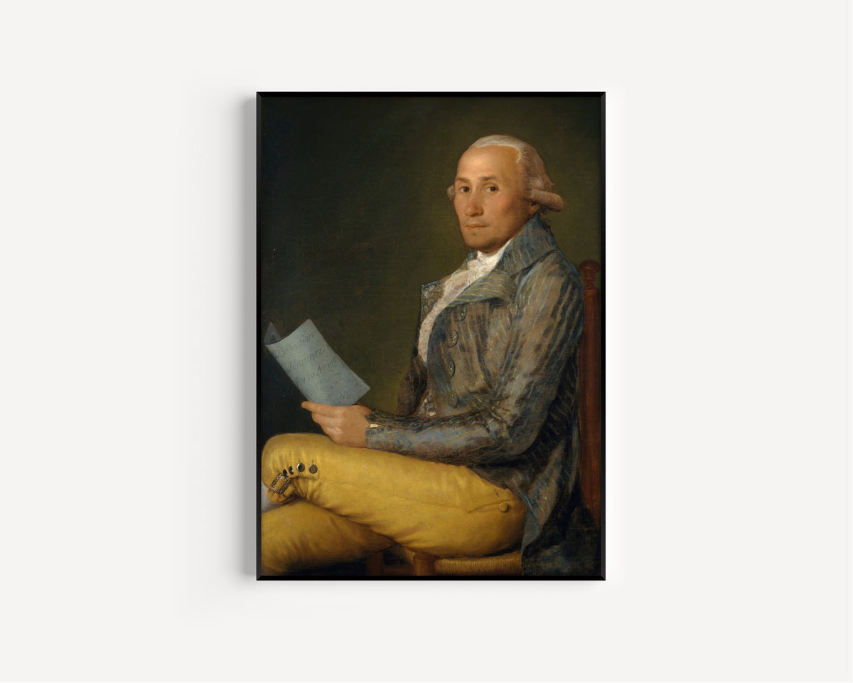 Framed art print of Sebastián Martínez y Pérez (1747–1800) by Francisco de Goya, in a slim black frame on a plain white wall