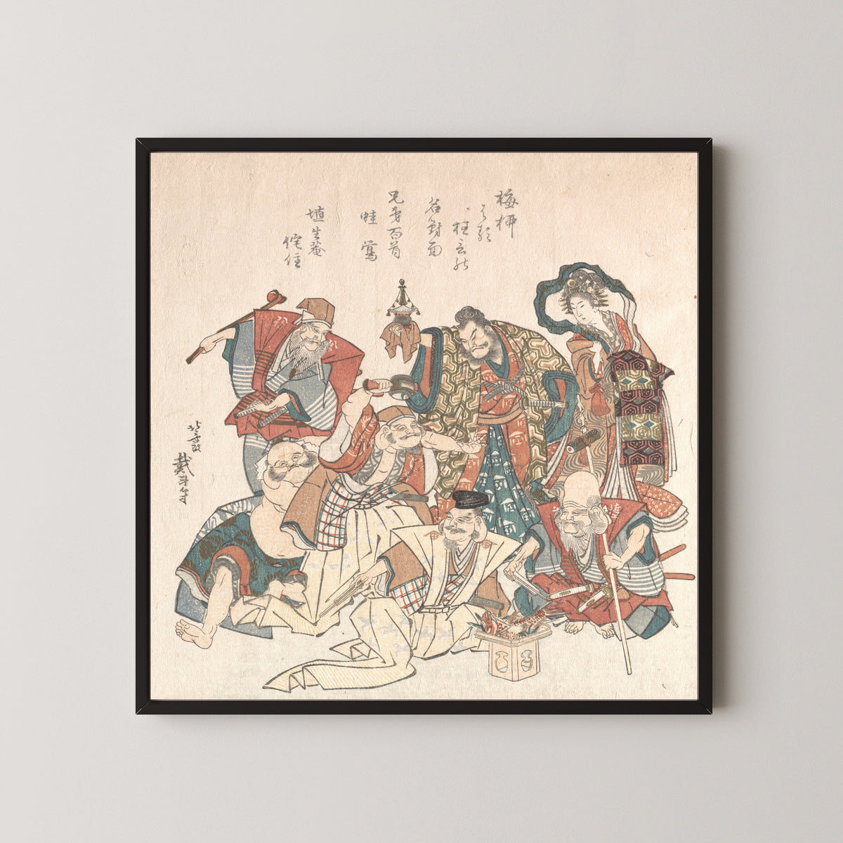 Framed art print of Seven Gods of Good Fortune by Katsushika Hokusai, in a black frame on a pale wall