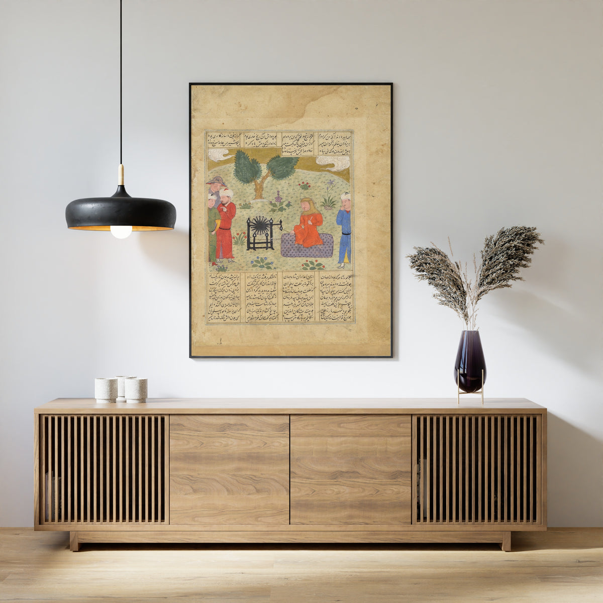 Framed art print of Shahnama: Bahram-e Chubineh Wears Women's Clothing and Spins Yarn, above a slatted wood sideboard