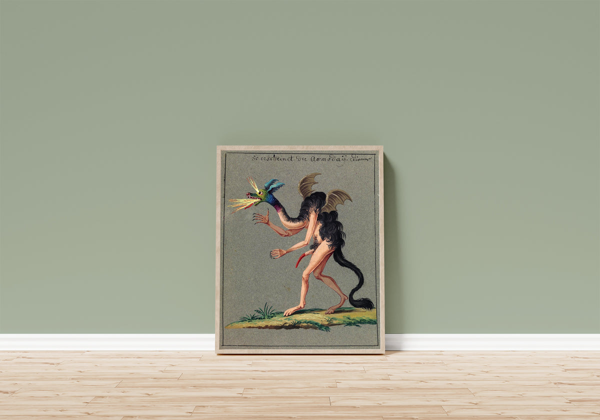 Framed art print of So erscheinet der Asmodai by Unknown artist, in a light wood frame leaning on a sage green wall above a wooden floor