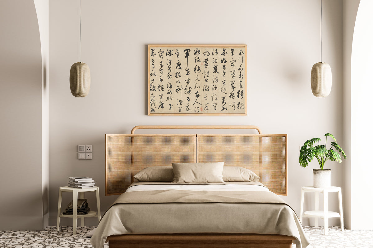 Song of the Stone Drums by Xianyu Shu — framed above a cane-headboard bed