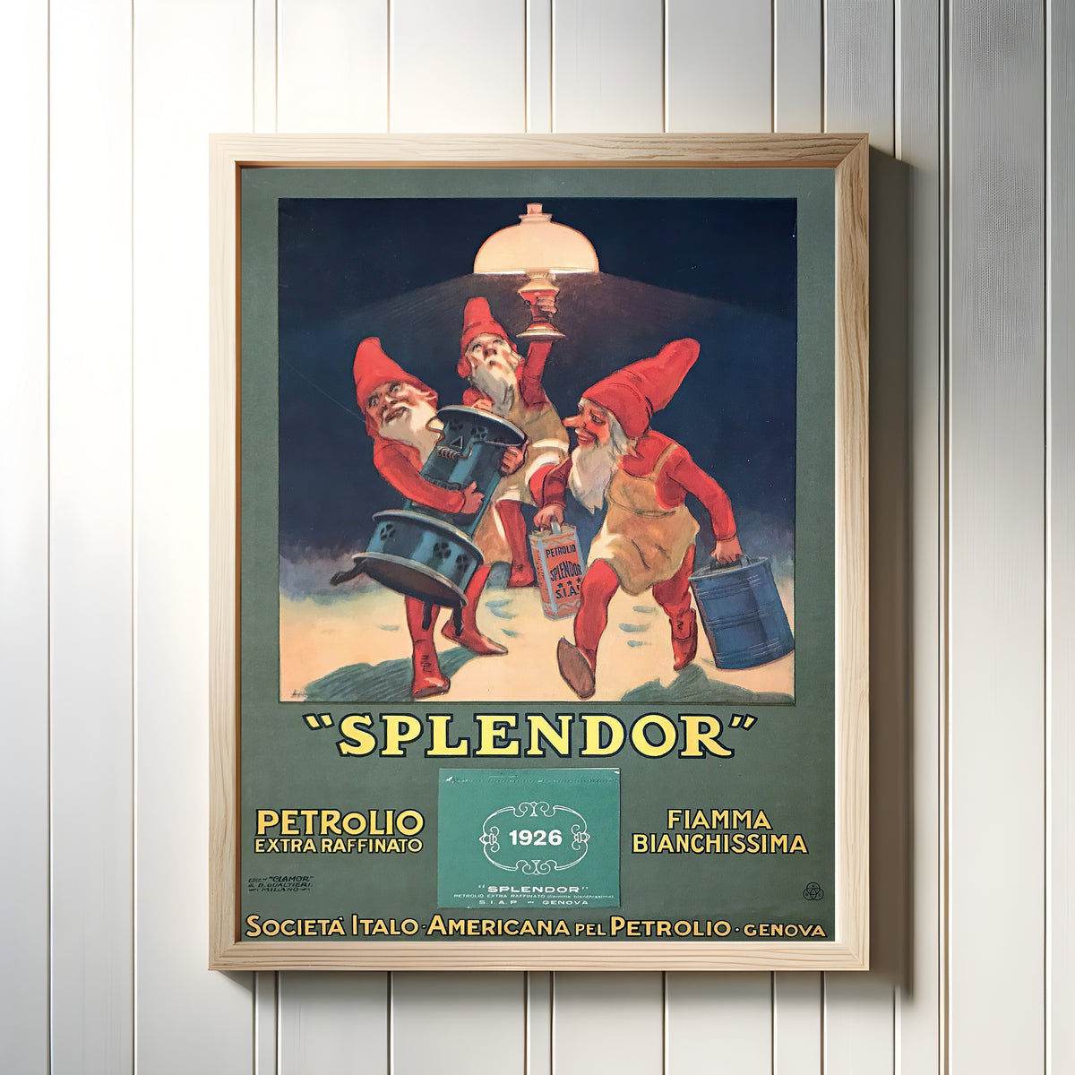 Framed art print of Splendor: Petrolio Extra Raffinato, Fiamma Bianchissima by Leopoldo Metlicovitz, in a light wood frame on a white panelled wall