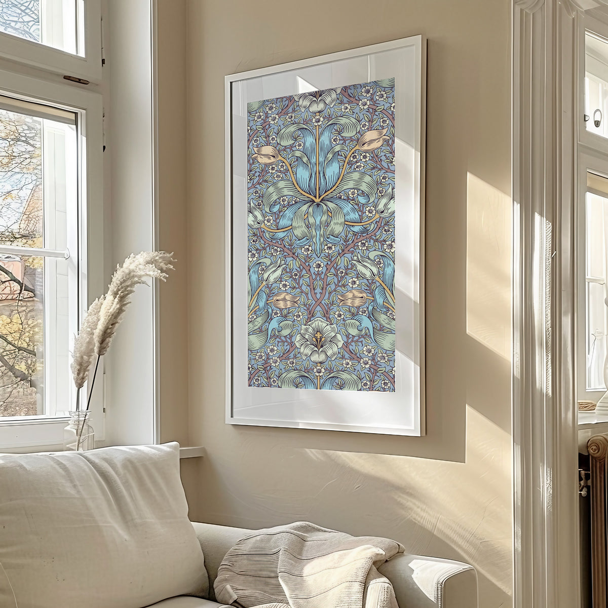 Framed art print of Spring Thicket by William Morris, in a sunlit living room above a sofa