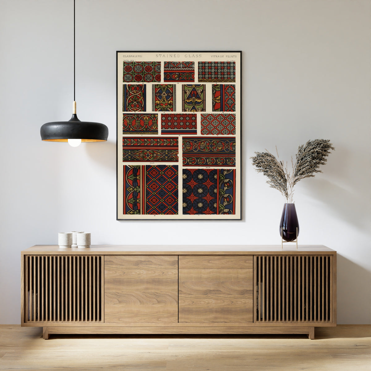 Stained Glass plate 2 by Owen Jones — framed above a slatted wood sideboard