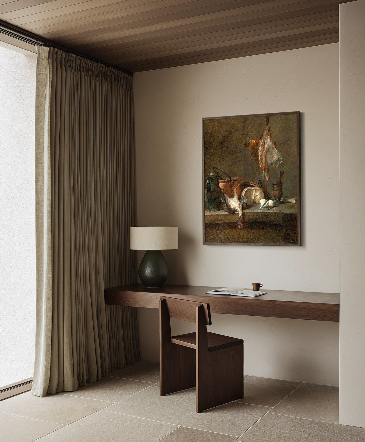 Framed art print of Still Life with Ray and Basket of Onions by Jean-Siméon Chardin, in a dark wood frame on a plaster wall above a walnut desk