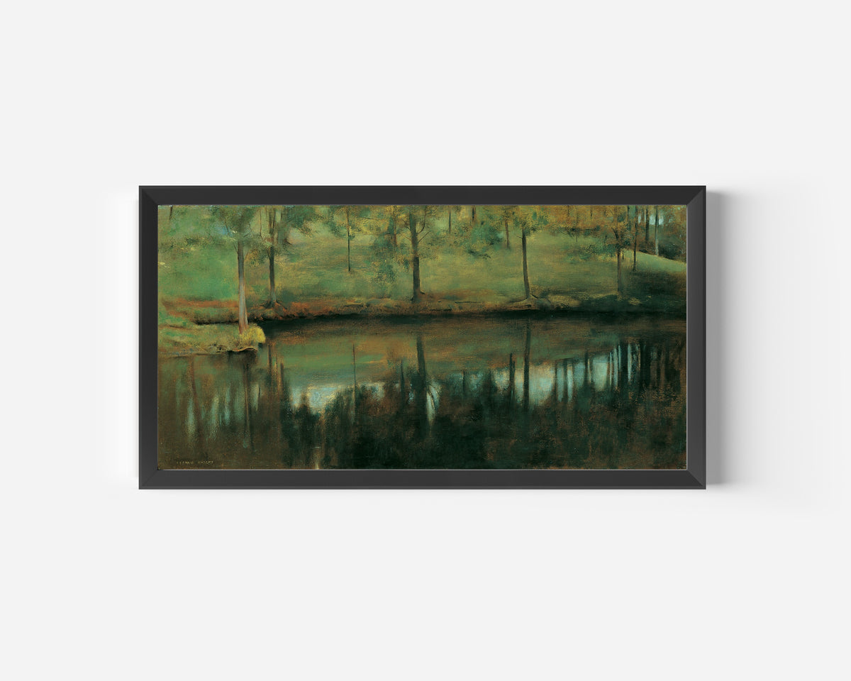 Framed art print of Still Water by Fernand Khnopff, in a wide black frame on a plain white wall