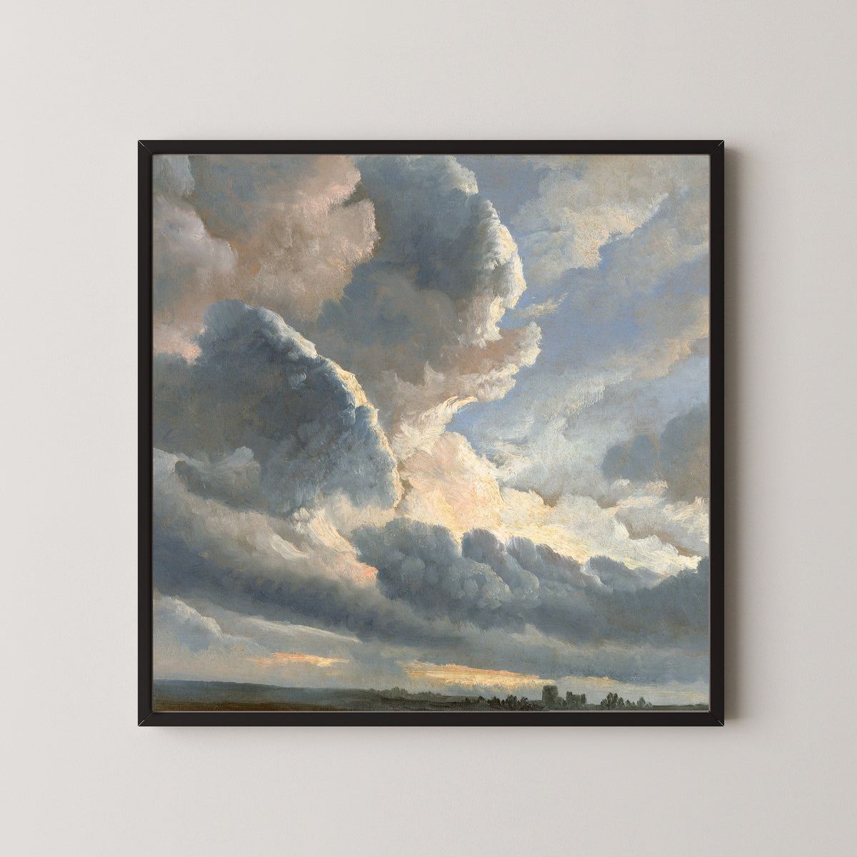 Study of Clouds with a Sunset near Rome by Simon Denis — in a black frame on a pale wall