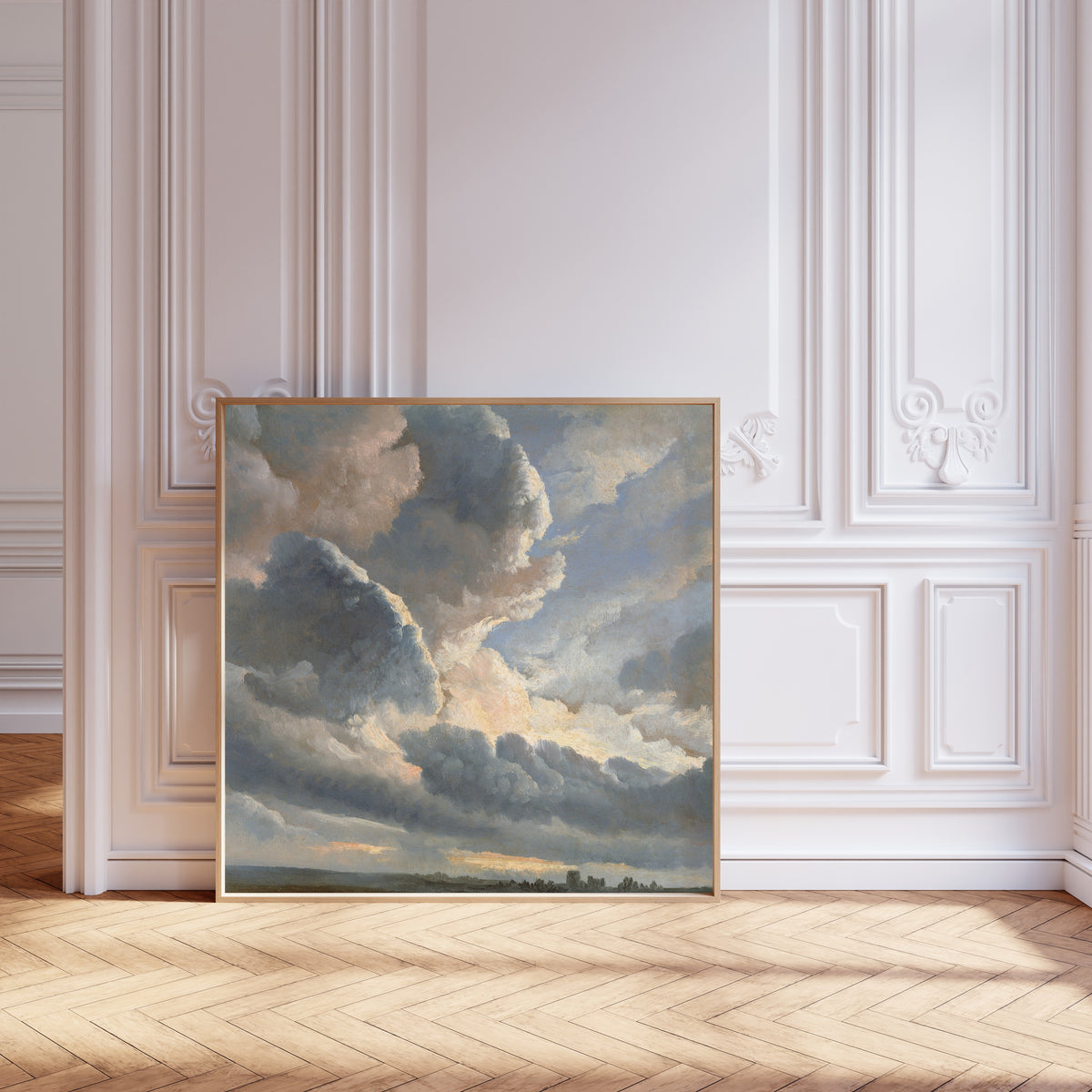 Study of Clouds with a Sunset near Rome by Simon Denis — framed and leaning against pale pink panelling on a herringbone floor