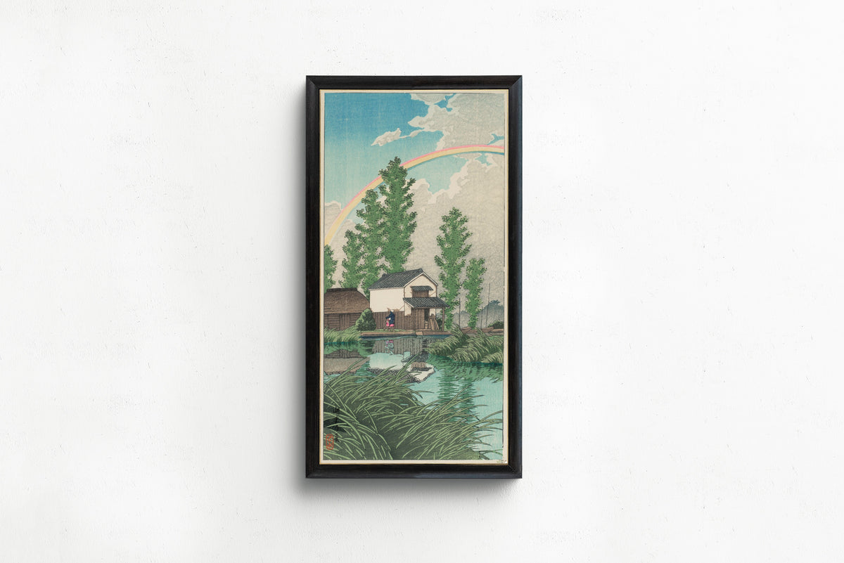 Framed art print of Summer at Itako by Kawase Hasui, in a slim black frame on a plain white wall