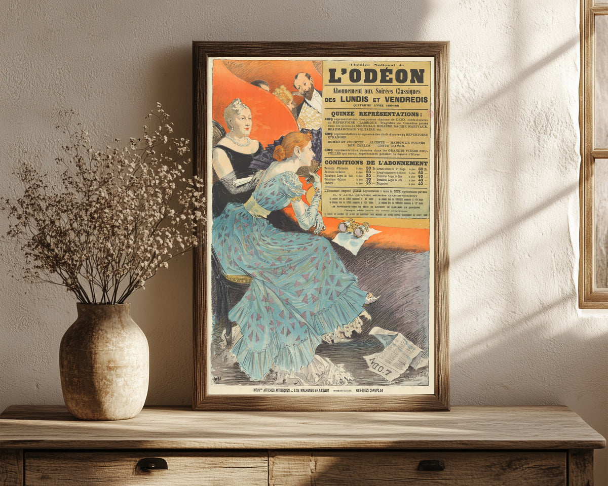 Framed art print of Théatre National de l'Odéon. Abonnement aux… by Eugène Grasset, in a dark wood frame leaning on a rustic console beside dried flowers