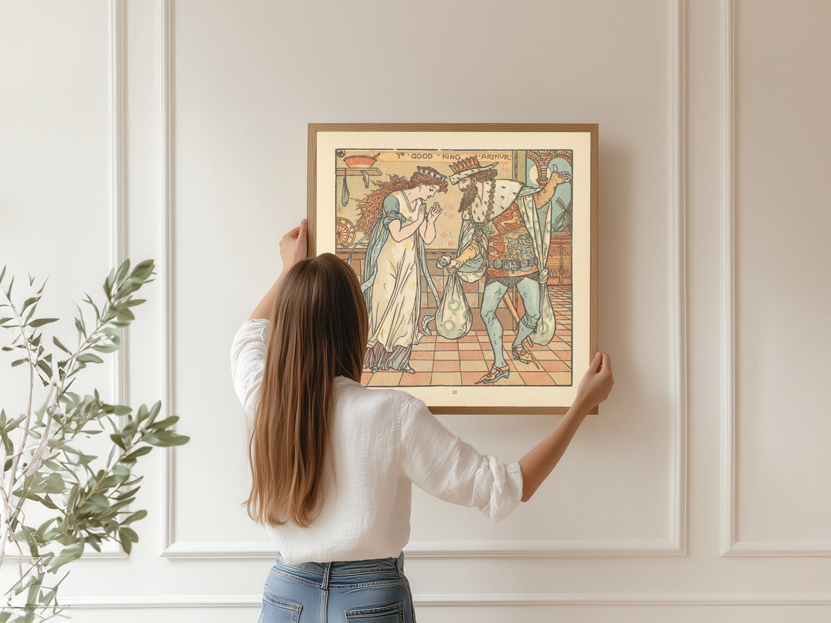 Framed art print of The Baby's Opera: Ye Good King Arthur by Walter Crane, hung on a panelled wall