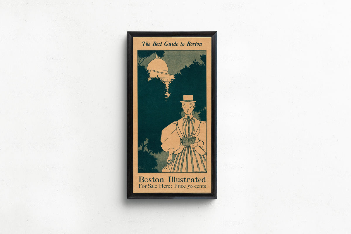 Framed art print of The Best Guide to Boston by Ethel Reed, in a slim black frame on a plain white wall