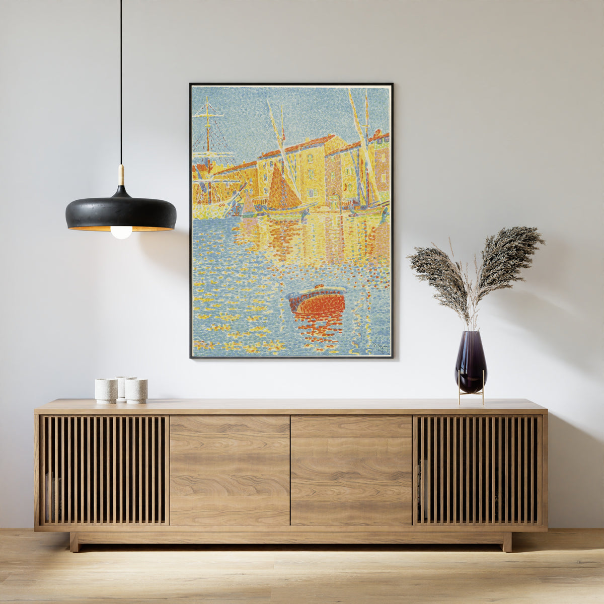 Framed art print of The Buoy by Paul Signac, above a slatted wood sideboard
