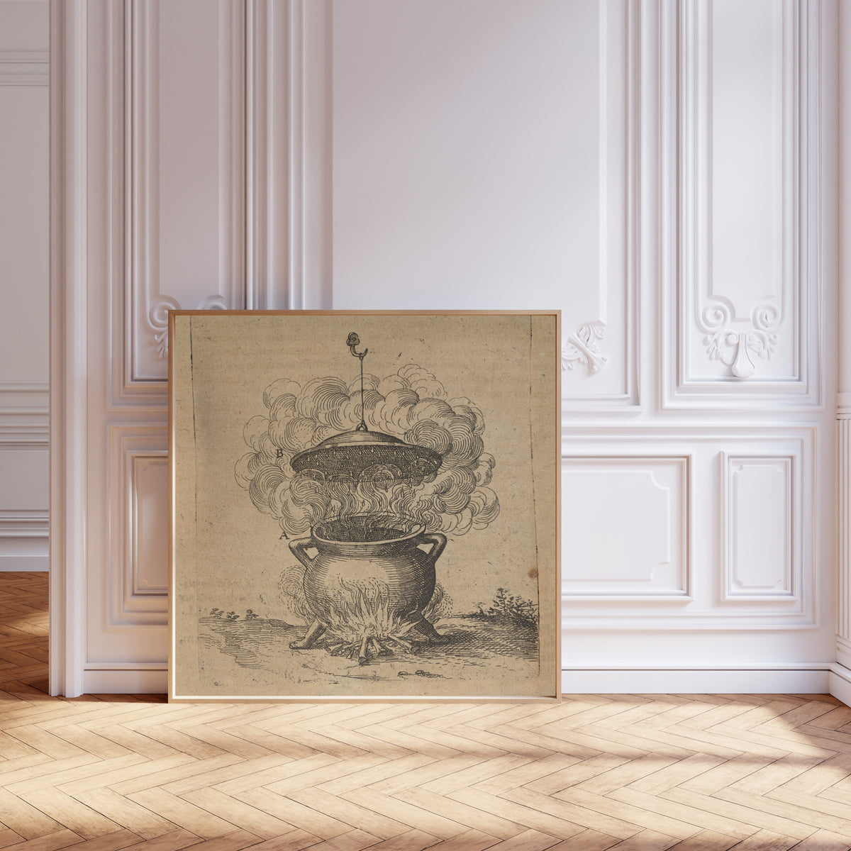 Framed art print of The Cauldron of Imperfect Mixtures over a Fire (Utriusque… by Robert Fludd, leaning against pale pink panelling on a herringbone floor