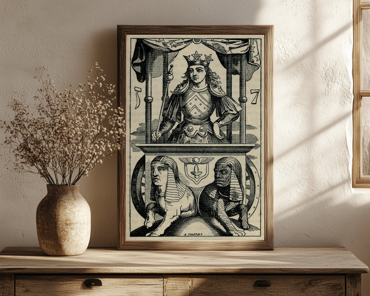 Framed art print of The Chariot of Hermes by Éliphas Lévi, in a dark wood frame leaning on a rustic console beside dried flowers