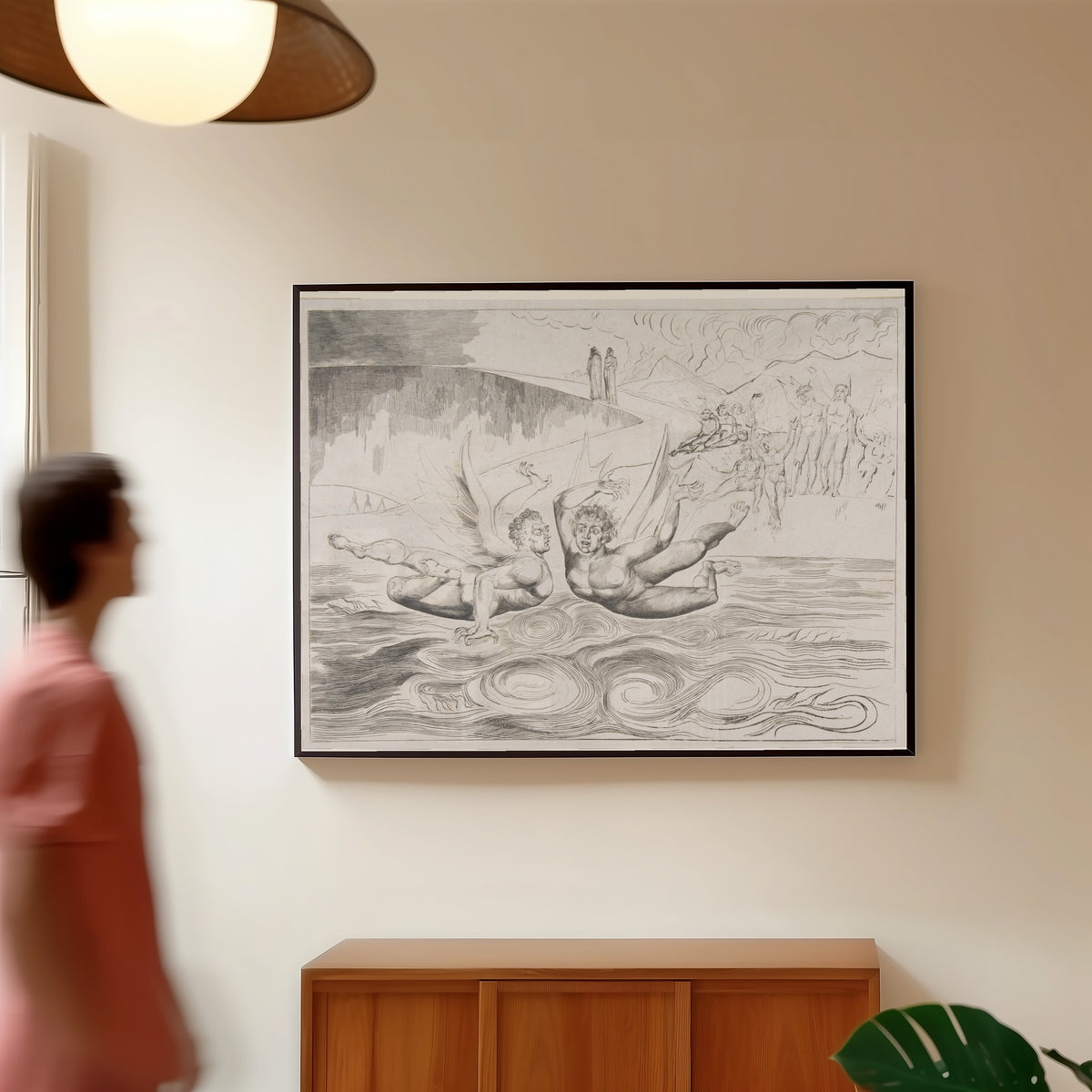 Framed art print of The Circle of Corrupt Officials: The Devils Mauling Each Other by William Blake, in a slim black frame on a warm wall in a sunlit room