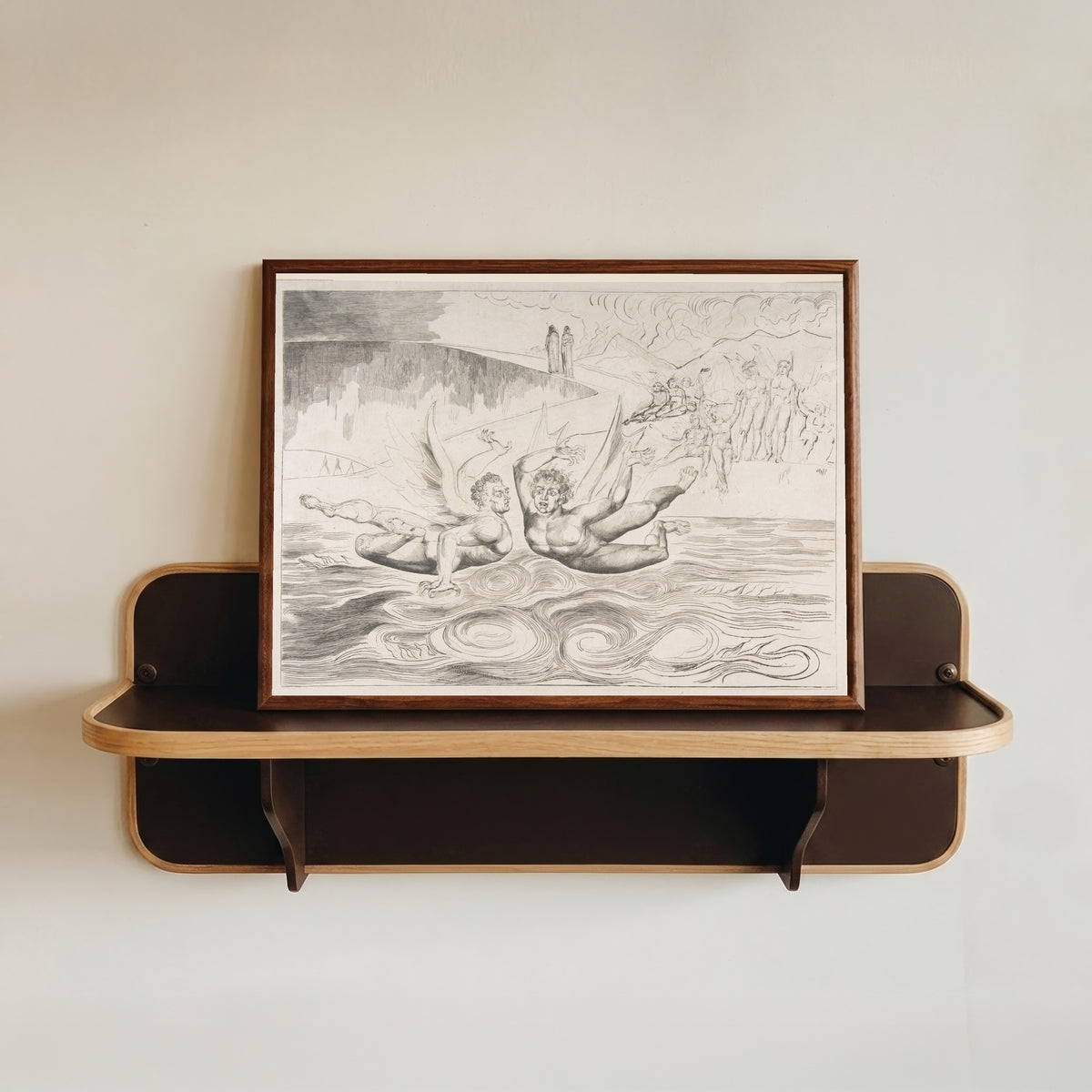 Framed art print of The Circle of Corrupt Officials: The Devils Mauling Each Other by William Blake, in a dark wood frame resting on a wall shelf