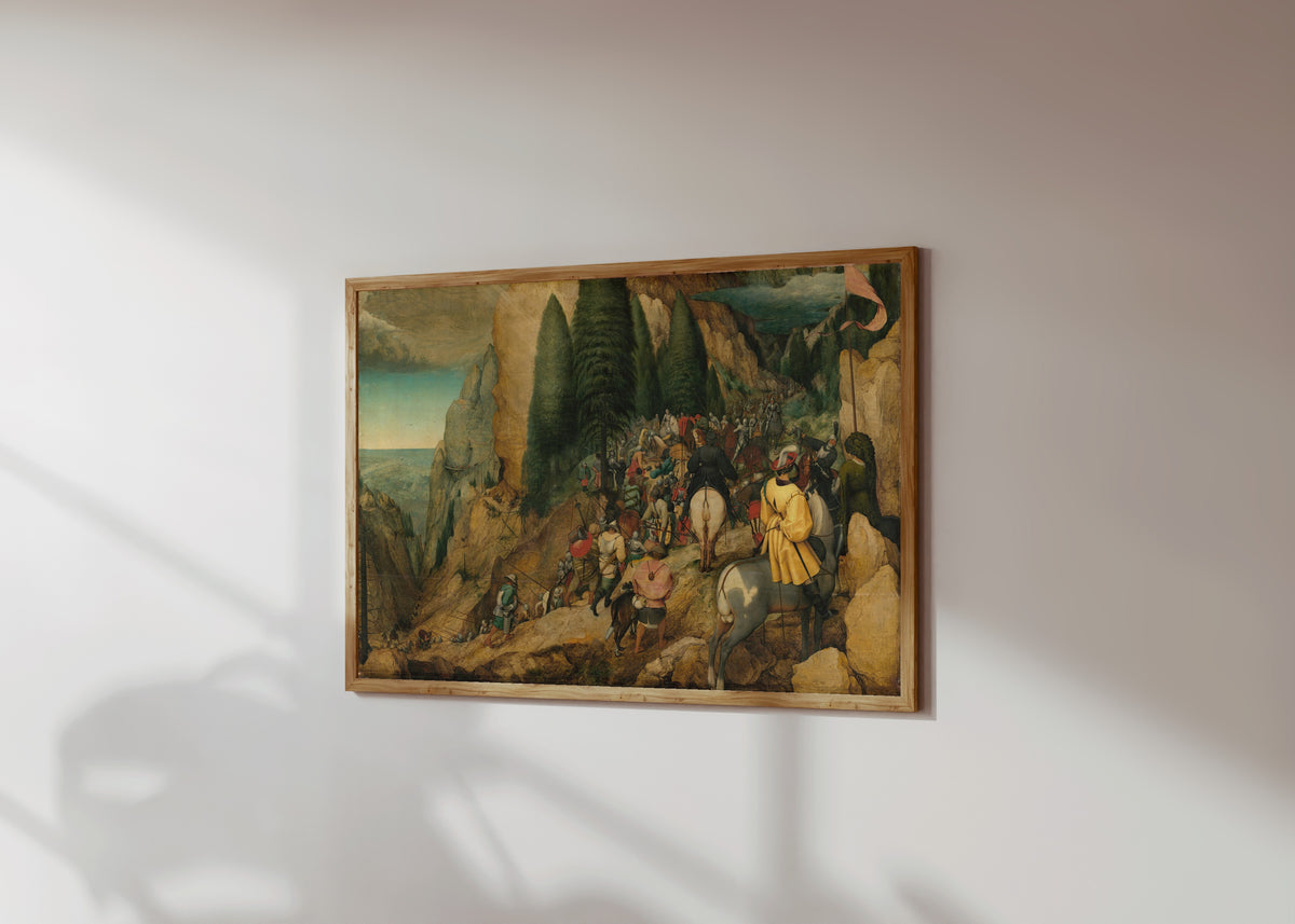 Framed art print of The Conversion of Paul by Pieter Bruegel the Elder, in a light wood frame on a sunlit white wall, seen at a slight angle