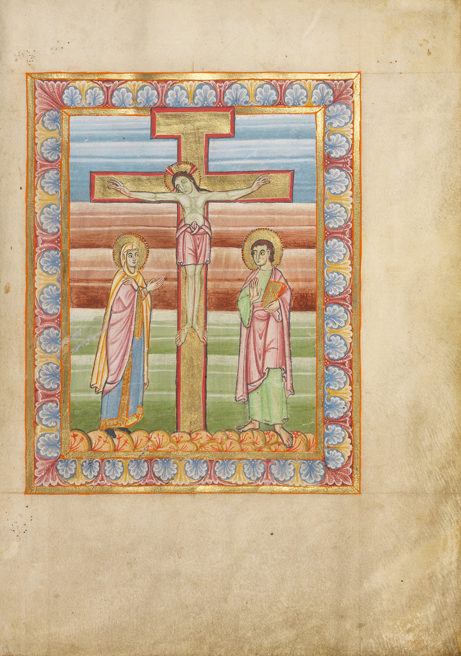 The Crucifixion (Banded Sky) | Illuminated Manuscript Print shown to scale on a wall above a sofa