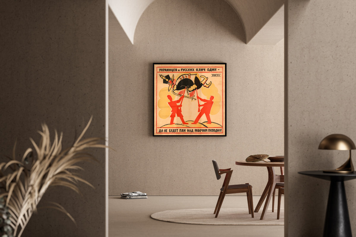 Framed art print of The Cry of Ukrainians and Russians Is One: Let No Lord Be Master Over the Worker! by Vladimir Mayakovsky, in a sunlit dining corner