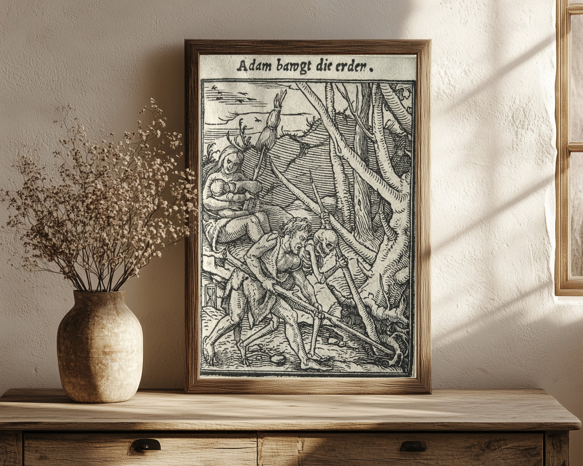 Framed art print of The Dance of Death: Adam bawgt die… by Hans Holbein the Younger, in a dark wood frame leaning on a rustic console beside dried flowers