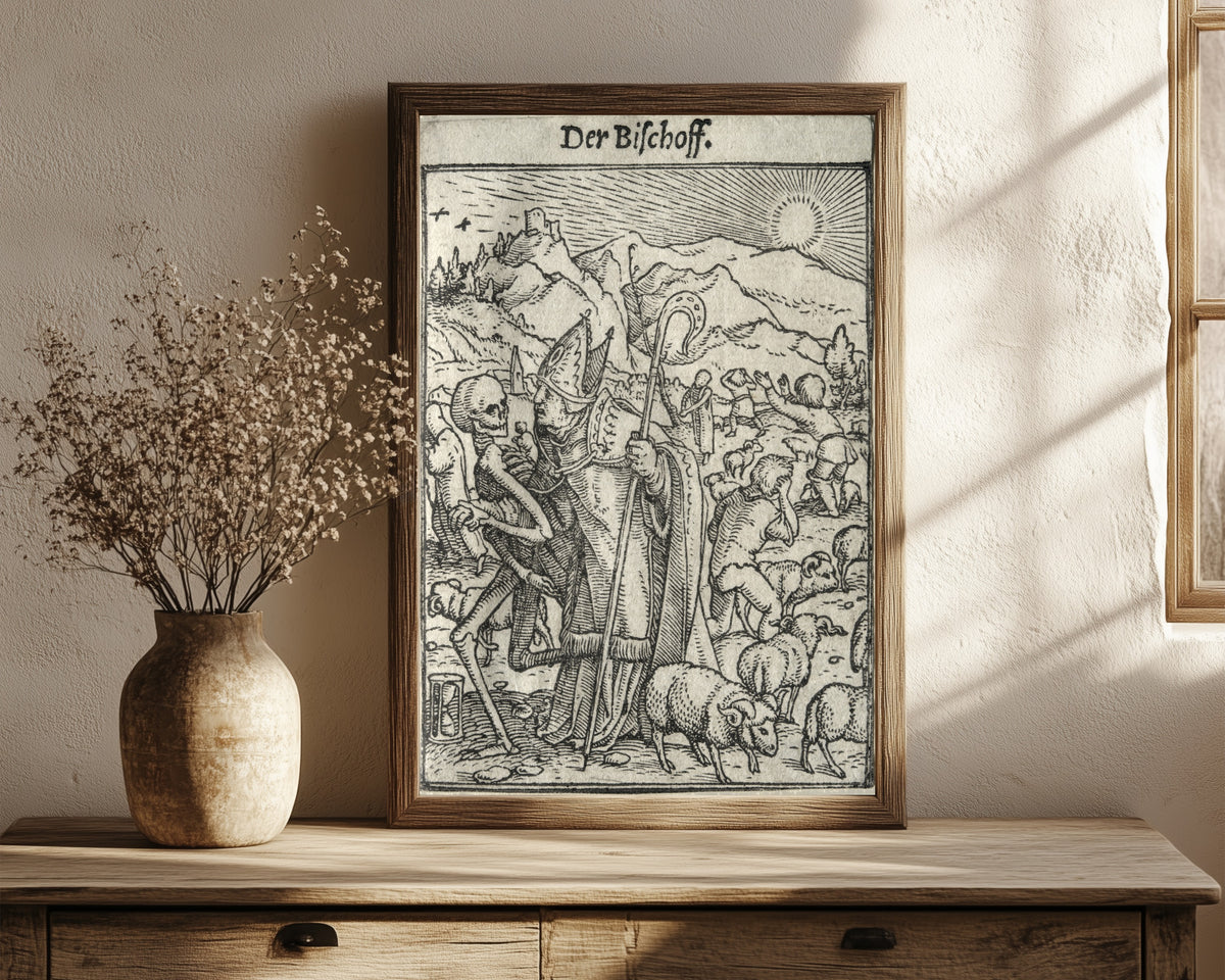 Framed art print of The Dance of Death: Der Bischoff (The… by Hans Holbein the Younger, in a dark wood frame leaning on a rustic console beside dried flowers