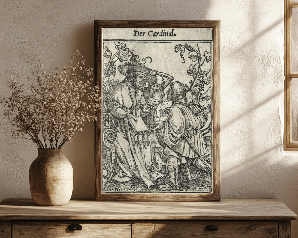 Framed art print of The Dance of Death: Der Cardinal (The… by Hans Holbein the Younger, in a dark wood frame leaning on a rustic console beside dried flowers