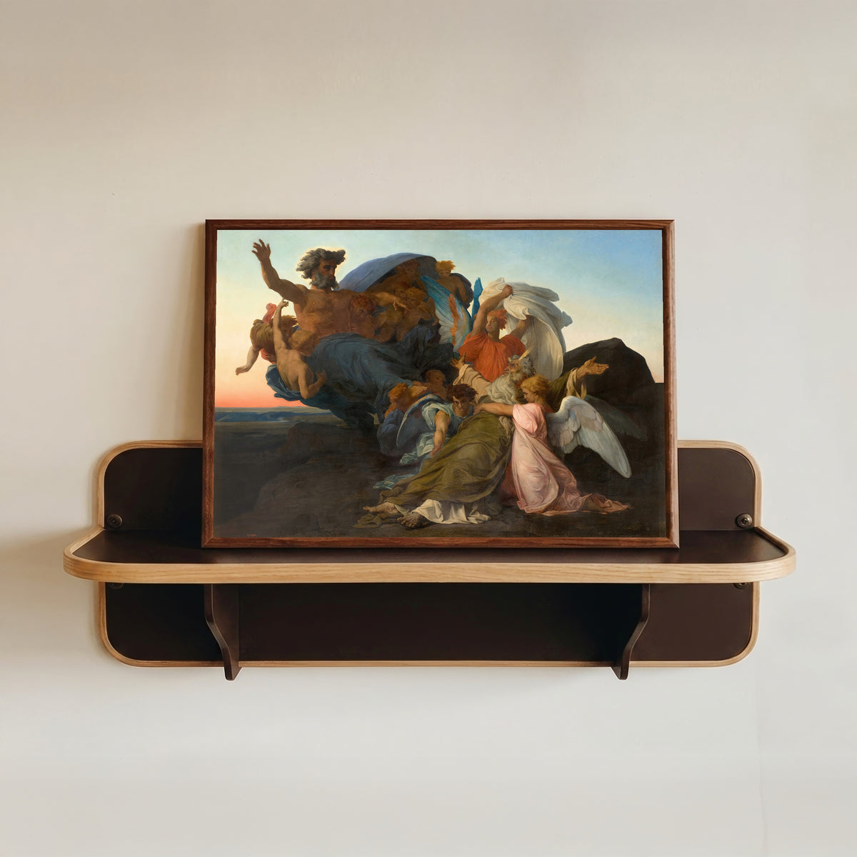 Framed art print of The Death of Moses by Alexandre Cabanel, in a dark wood frame resting on a wall shelf