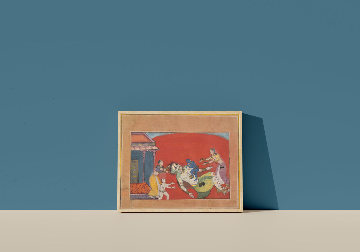 Framed art print of The Death of the Demoness Putana: Folio from a Bhagavata Purana Series by Bikaner school, in a light wood frame leaning on a blue wall