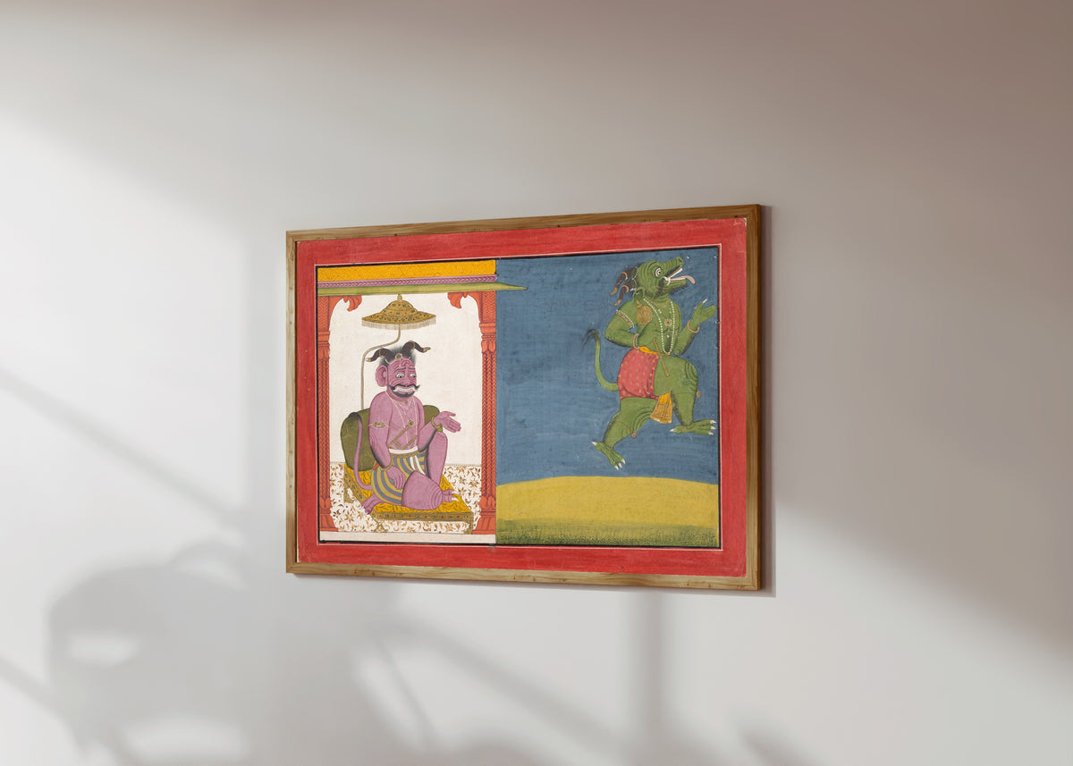 Framed art print of The Demon Hiranyaksha Departs the Demon Palace by Guler school, in a light wood frame on a sunlit white wall, seen at a slight angle