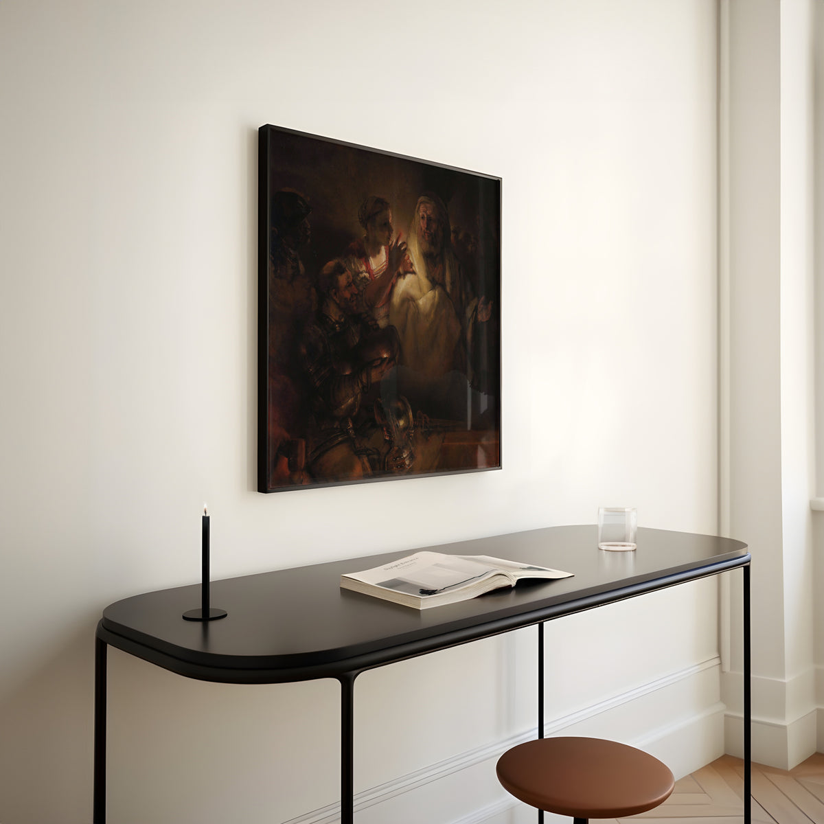 Framed art print of The Denial of St Peter by Rembrandt van Rijn, above a slim black console table