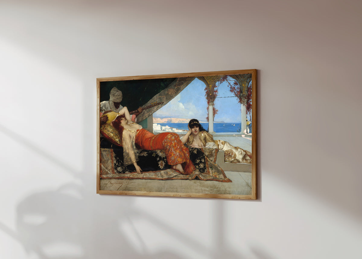 Framed art print of The Favorite of the Emir by Jean-Joseph Benjamin-Constant, in a light wood frame on a sunlit white wall, seen at a slight angle