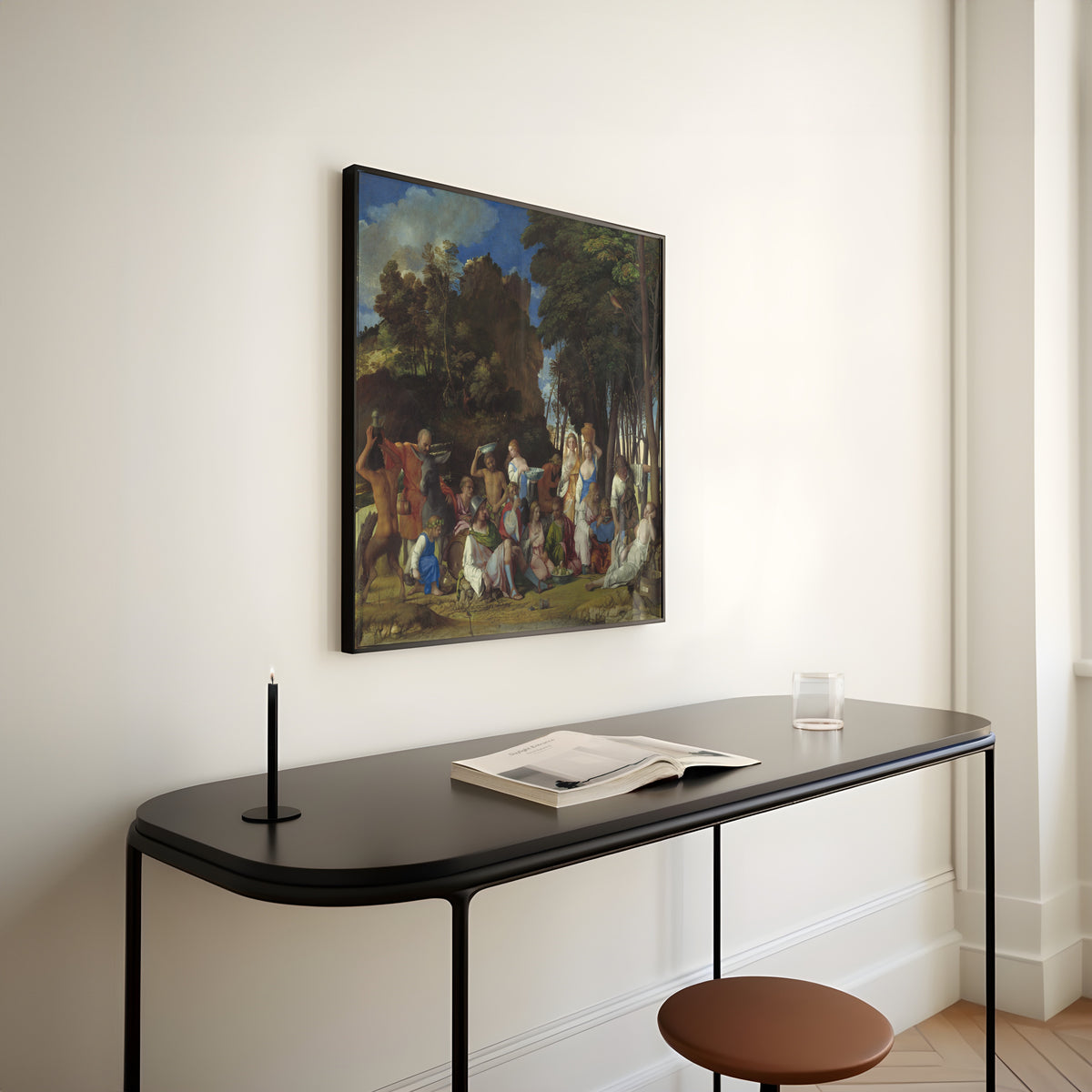 Framed art print of The Feast of the Gods by Giovanni Bellini, above a slim black console table
