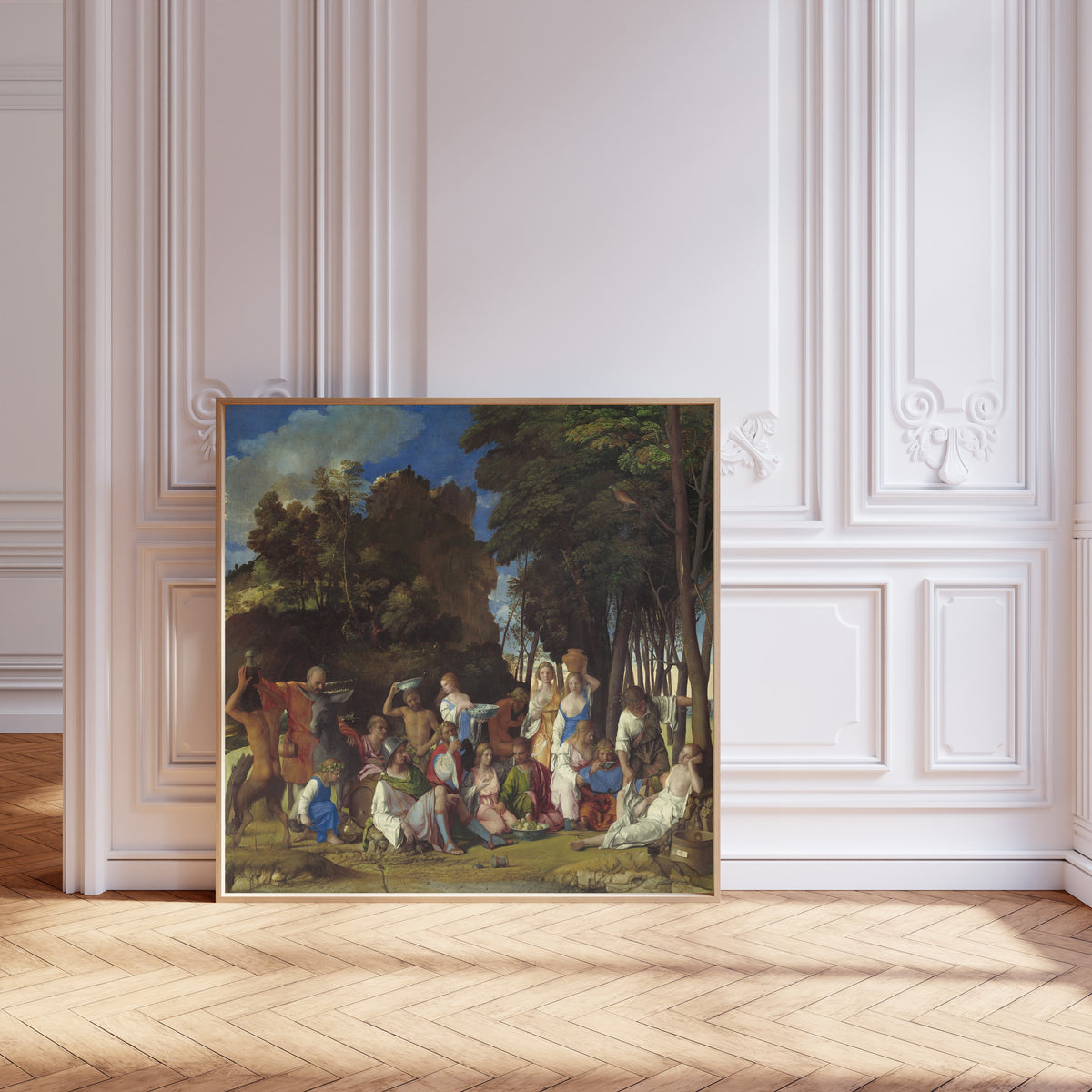 Framed art print of The Feast of the Gods by Giovanni Bellini, leaning against pale pink panelling on a herringbone floor