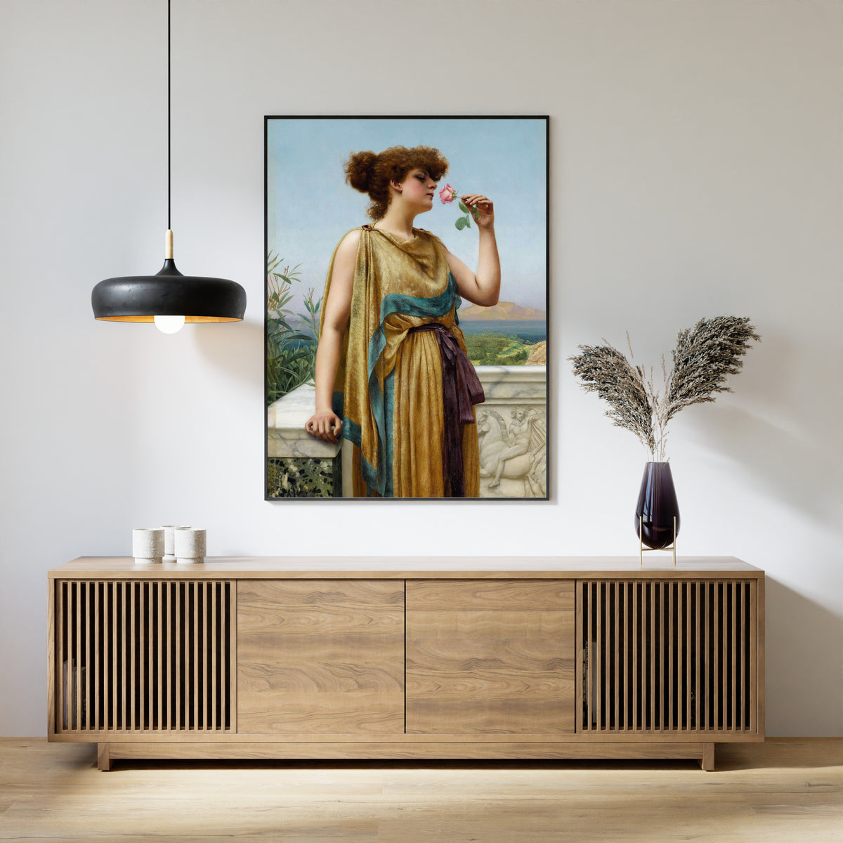 Framed art print of The Fragrant Rose by John William Godward, above a slatted wood sideboard