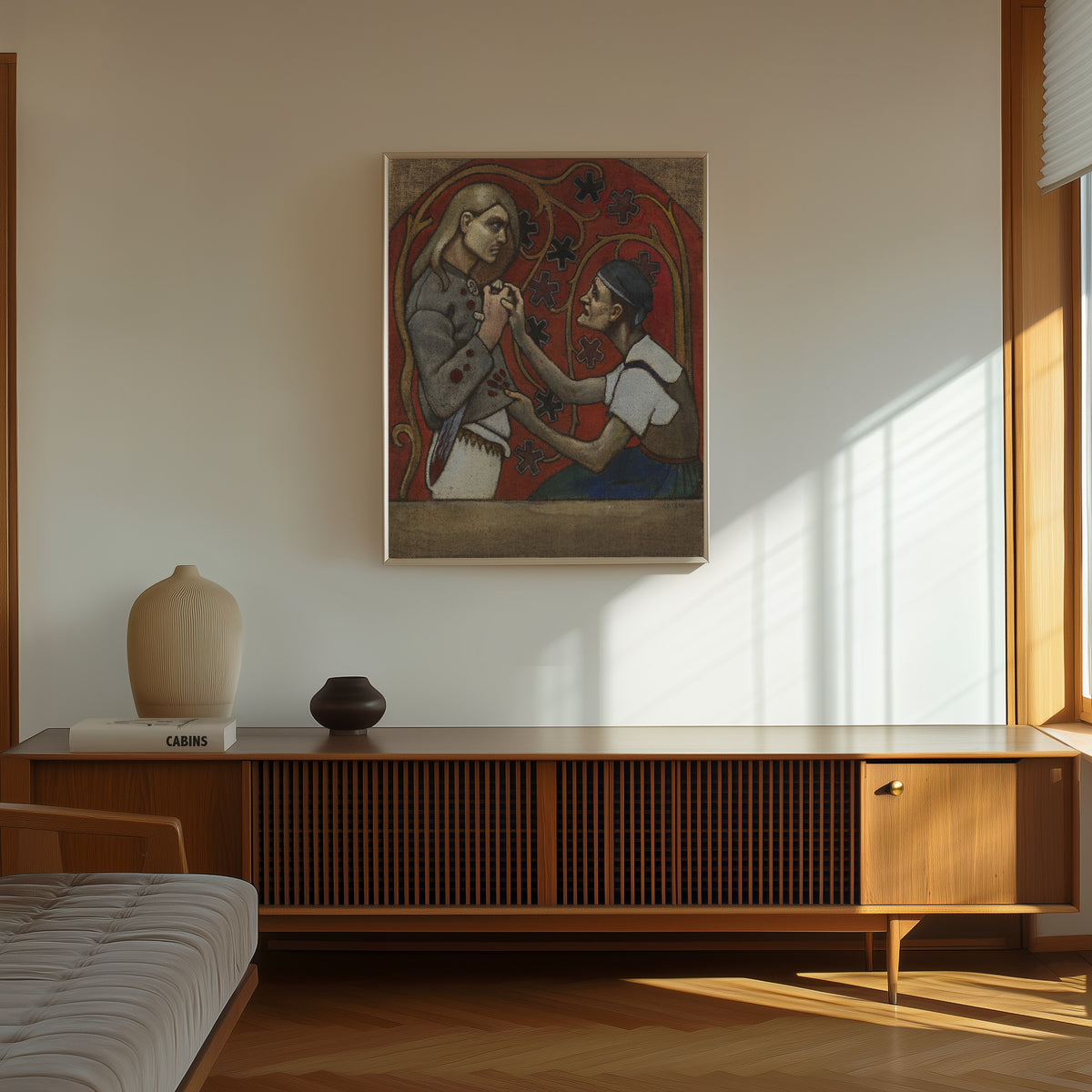 Framed art print of The Fratricide by Akseli Gallen-Kallela, in a thin light frame on a sunlit wall above a wooden sideboard