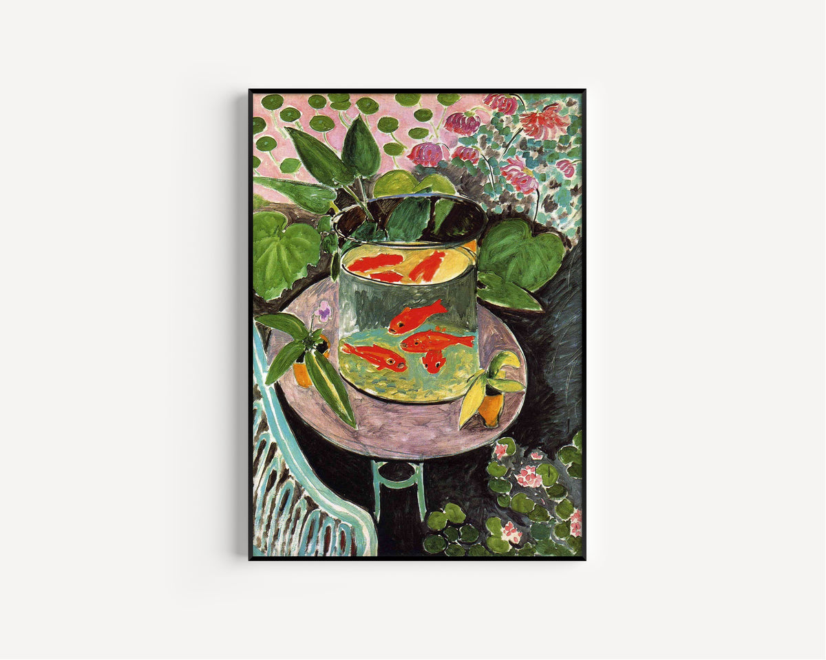 Framed art print of The Goldfish by Henri Matisse, in a slim black frame on a plain white wall