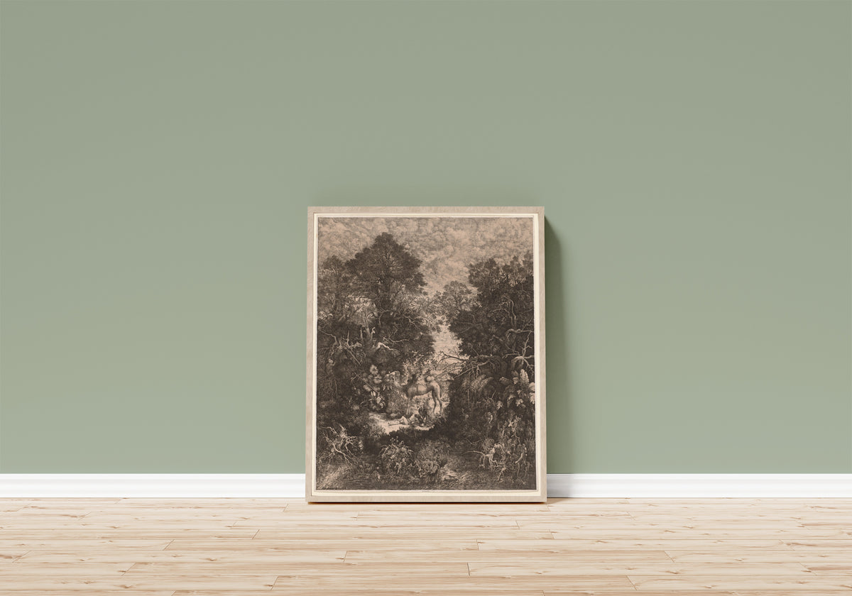 Framed art print of The Good Samaritan by Rodolphe Bresdin, in a light wood frame leaning on a sage green wall above a wooden floor
