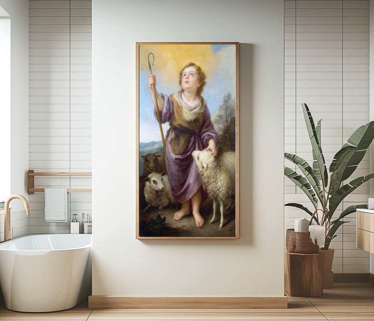 Framed art print of The Good Shepherd by Bartolomé Esteban Murillo, in a bathroom beside a freestanding tub