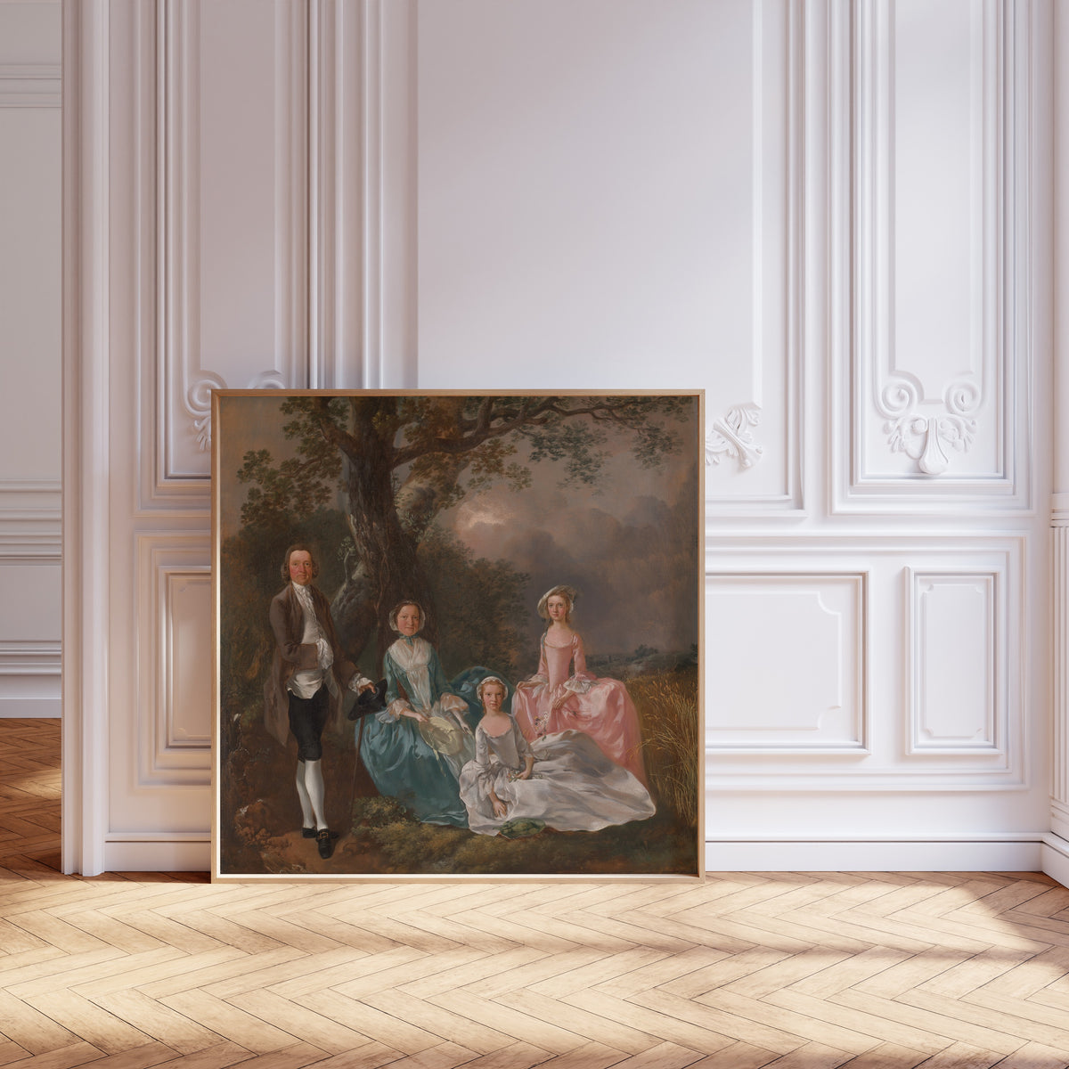 Framed art print of The Gravenor Family by Thomas Gainsborough, leaning against pale pink panelling on a herringbone floor