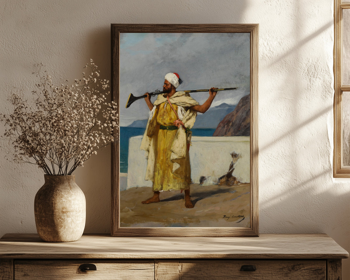 Framed art print of The Guard by Jean-Joseph Benjamin-Constant, in a dark wood frame leaning on a rustic console beside dried flowers