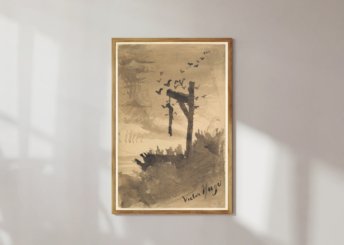 Framed art print of The Hanged Man by Victor Hugo, in a light wood frame on a sunlit white wall
