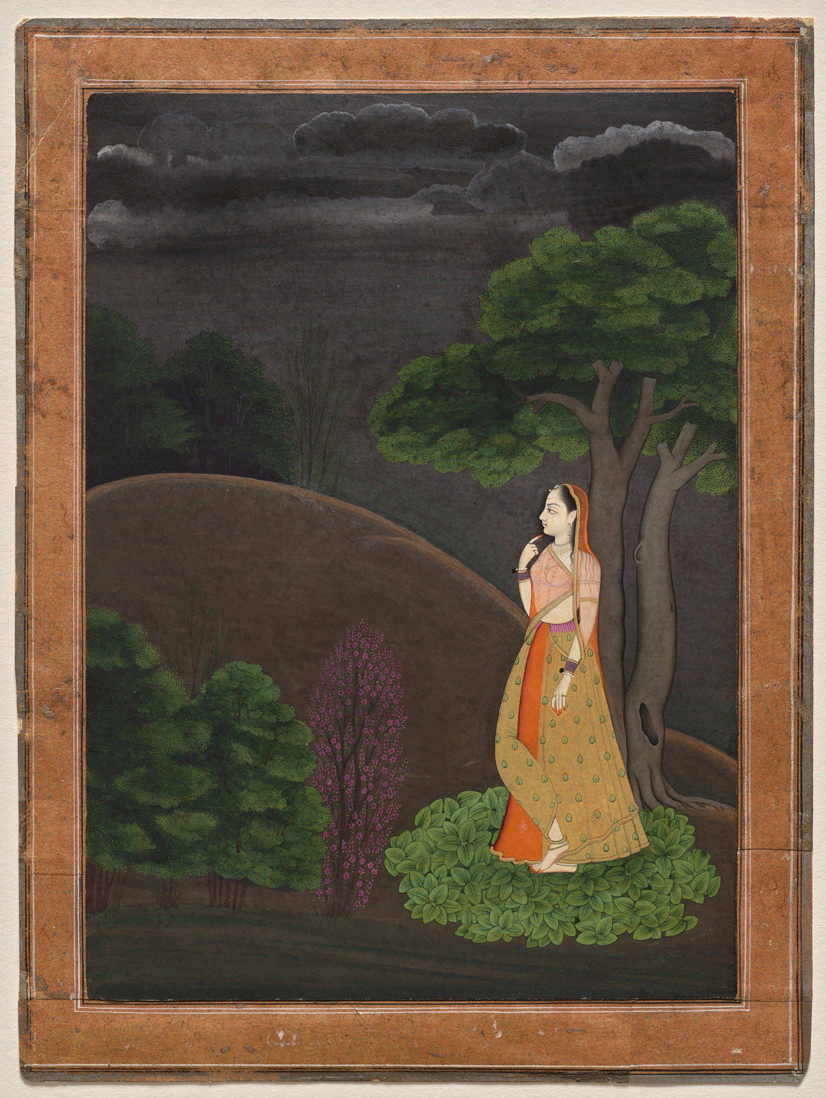 The Heroine Who Waits Anxiously for Her Absent Lover: Utka Nayika (Under a Dark Sky) by Pahari school — A lone heroine stands among dark trees under heavy